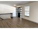 Spacious living room with hardwood floors and fireplace at 7101 W Yale Ave # 1206, Denver, CO 80227