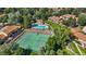 Aerial view of community tennis courts and swimming pool at 7101 W Yale Ave # 1206, Denver, CO 80227