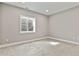 Bright bedroom with a window allowing ample natural light and neutral carpet at 1960 Wabash St, Denver, CO 80220