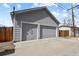 Two car garage with concrete driveway at 1960 Wabash St, Denver, CO 80220