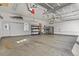 Spacious garage with shelving, door to outside, and automatic door openers at 1960 Wabash St, Denver, CO 80220