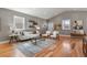 Comfortable living room showcasing natural light, contemporary decor, hardwood floors, and a welcoming seating arrangement at 1960 Wabash St, Denver, CO 80220