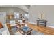 Elegant living room featuring hardwood floors, stylish furnishings, and plenty of natural light, creating a cozy atmosphere at 1960 Wabash St, Denver, CO 80220