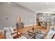 Spacious living area with hardwood floors, vaulted ceilings, an open floor plan, and a seamless connection to the kitchen at 1960 Wabash St, Denver, CO 80220