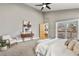 Bright main bedroom with stylish furniture, a private balcony, and modern decor with unique artwork at 1960 Wabash St, Denver, CO 80220