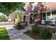 Inviting brick facade with manicured landscaping, porch and updated facade at 2 S Monroe St, Denver, CO 80209
