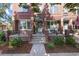 Charming brick home with well-maintained front yard landscaping at 2 S Monroe St, Denver, CO 80209