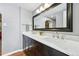 Spacious bathroom with double sinks, modern fixtures, and marble countertops at 1165 N Pennsylvania St # G2, Denver, CO 80203