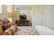Bedroom featuring a study area and ample lighting at 1165 N Pennsylvania St # G2, Denver, CO 80203