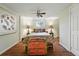 Bedroom featuring a ceiling fan and hardwood floors at 1165 N Pennsylvania St # G2, Denver, CO 80203