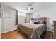 Comfortable bedroom features a plush bed, natural light, and stylish decor at 1165 N Pennsylvania St # G2, Denver, CO 80203