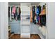 Walk-in closet with built-in shelving units and ample storage space at 1165 N Pennsylvania St # G2, Denver, CO 80203