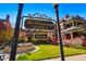 Charming exterior view of The Pennborough with lush landscaping at 1165 N Pennsylvania St # G2, Denver, CO 80203