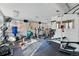 Spacious gym with weight machines, exercise bike, and free weights at 1165 N Pennsylvania St # G2, Denver, CO 80203