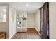 Bright office space with wood floors, natural light, and a built-in bookshelf at 1165 N Pennsylvania St # G2, Denver, CO 80203