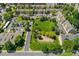 Aerial view showcases the community layout with green spaces, parking, and residential buildings at 4850 E Kentucky Ave # C, Denver, CO 80246