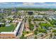 Neighborhood aerial view featuring community amenities and serene lake views, all in a well-maintained environment at 4850 E Kentucky Ave # C, Denver, CO 80246