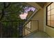 Balcony view with a dramatic sunset and neighborhood scenery at 4850 E Kentucky Ave # C, Denver, CO 80246