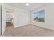 Bedroom featuring a large window and closet at 4850 E Kentucky Ave # C, Denver, CO 80246