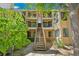 Inviting exterior view of the building's facade featuring well-maintained balconies and stairway access at 4850 E Kentucky Ave # C, Denver, CO 80246