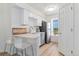 Bright kitchen features stainless steel appliances, breakfast bar, and a window at 4850 E Kentucky Ave # C, Denver, CO 80246