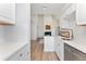 Kitchen flows into living room, ideal for entertaining at 4850 E Kentucky Ave # C, Denver, CO 80246