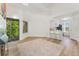 Living room flows into kitchen with easy access to balcony at 4850 E Kentucky Ave # C, Denver, CO 80246