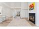 Living room with fireplace leads to other rooms in the house at 4850 E Kentucky Ave # C, Denver, CO 80246