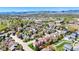 Aerial view of the property, highlighting its location and the surrounding neighborhood with mountain views at 14533 W 69Th Pl, Arvada, CO 80004