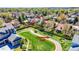 This aerial view highlights the property's location next to a community park with walking paths at 14533 W 69Th Pl, Arvada, CO 80004
