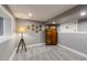 Finished basement features neutral paint, carpet, recessed lighting and furniture at 14533 W 69Th Pl, Arvada, CO 80004