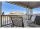 Private balcony with seating area and views of surrounding area at 23406 E 5Th Pl # 203, Aurora, CO 80018