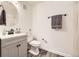 Updated bathroom with vanity, toilet, and shower at 23406 E 5Th Pl # 203, Aurora, CO 80018