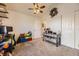 Bright bedroom with a ceiling fan and plenty of natural light at 23406 E 5Th Pl # 203, Aurora, CO 80018
