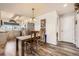 Bright dining area with table and chairs, adjacent to kitchen at 23406 E 5Th Pl # 203, Aurora, CO 80018