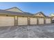 Exterior view of attached garages at 23406 E 5Th Pl # 203, Aurora, CO 80018