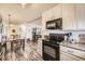 Modern kitchen with stainless steel appliances and granite countertops at 23406 E 5Th Pl # 203, Aurora, CO 80018
