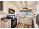 Well-equipped kitchen featuring stainless steel appliances and granite countertops at 23406 E 5Th Pl # 203, Aurora, CO 80018