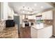 Well-equipped kitchen boasting stainless steel appliances, granite countertops, and ample cabinetry at 5573 S Taft St, Littleton, CO 80127