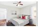 Relaxing bedroom with hardwood floors, a ceiling fan, and ample natural light at 4421 Raleigh St, Denver, CO 80212