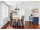 Dining room with modern lighting and built-in bar at 4421 Raleigh St, Denver, CO 80212