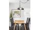 Dining room with seating and modern lighting at 4421 Raleigh St, Denver, CO 80212
