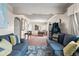 Spacious living room showcasing open layout to dining area at 75 Vrain St, Denver, CO 80219