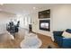 Open concept common area with fireplace, wet bar, and home office at 1276 S Logan St, Denver, CO 80210