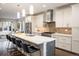 Modern kitchen with a large island and stainless steel appliances at 1276 S Logan St, Denver, CO 80210