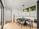 Bright dining space featuring modern lighting and a cozy built-in bench at 2025 Fenton St, Edgewater, CO 80214