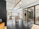 Modern dining area with open floor plan and views of the backyard at 2025 Fenton St, Edgewater, CO 80214