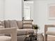 Stylish living room with comfortable seating, modern decor, and natural light at 2025 Fenton St, Edgewater, CO 80214