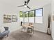 Bright home office with large windows, stylish desk, and comfortable seating at 2025 Fenton St, Edgewater, CO 80214