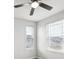 Neutral colored bedroom with two windows showing the houses across the street at 3831 E 141St Ave, Thornton, CO 80602